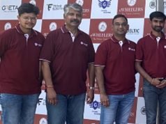 CEO of eWheelers Vasu Deva Reddy Beerala(4th from left) poses with his team at the unveiling of Haryana's unique Electric Vehicle Fulfillment Centre.