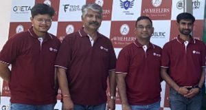 CEO of eWheelers Vasu Deva Reddy Beerala(4th from left) poses with his team at the unveiling of Haryana's unique Electric Vehicle Fulfillment Centre.