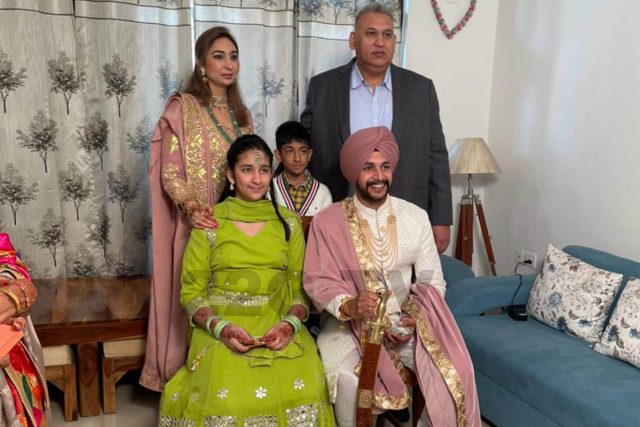 Dilnawaz Kaur (sitting 1st from left) who became a sarbala at her uncle's(sitting 2nd from left) wedding