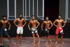 Participants flexing their muscles at “NPC North India and Mr. Tricity” bodybuilding and physique championship held at Indradhanush Auditorium, Sector 5 Panchkula. (2)