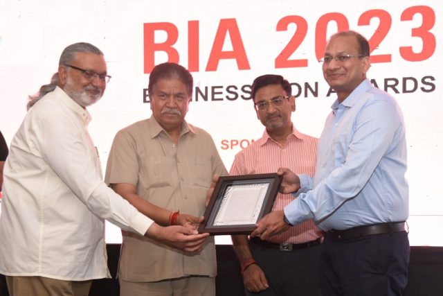 Ashish Mittal, Director, Royale Estate Group(4th from left) receiving the Business Icon Award