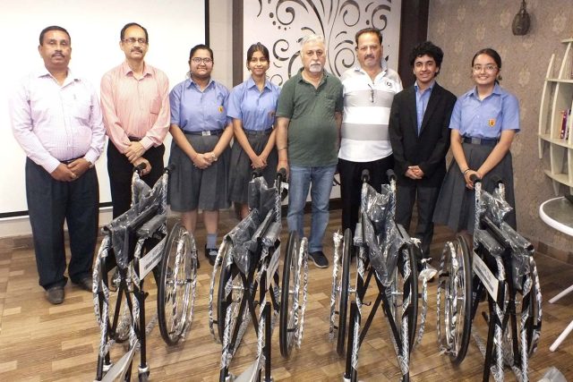 Hope Club & other students with representatives of 2 main temples of Chandigarh that have been given wheelchairs by the club for needy devotees..JPG