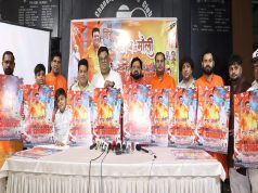 Raman Dewan (6th from left) singer of 'Haath Mein Mauli' alongwith members of the cast of the song's video and others, unveiling the poster of the song at its launch in Chandigarh Press Club.