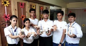 Students showing 'catapults' they prepared at a science event held as part of the 'Annual Vivek Fiesta '24'