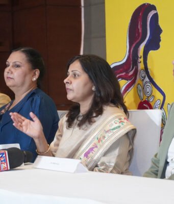 Dr Preeti Jindal sharing details about the 'Touch- Tweens & Teens ' event with media. The event showcased a charity walk to collect funds for underprivileged girls needing medical help.